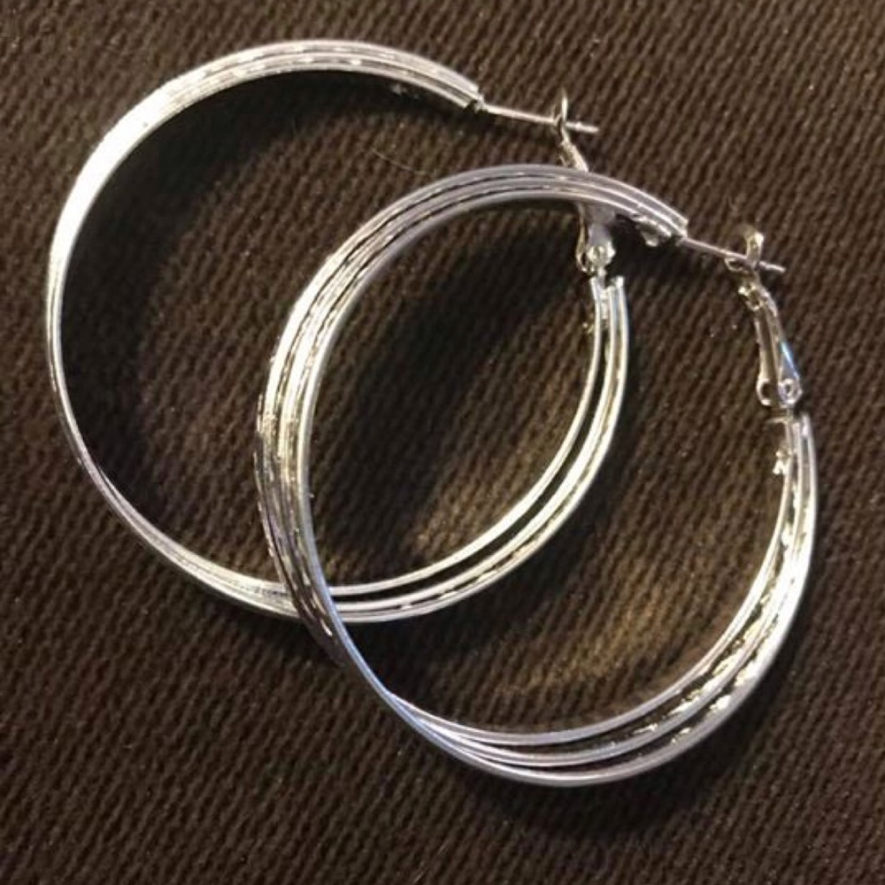 Earrings are 2" hoops Sterling silver